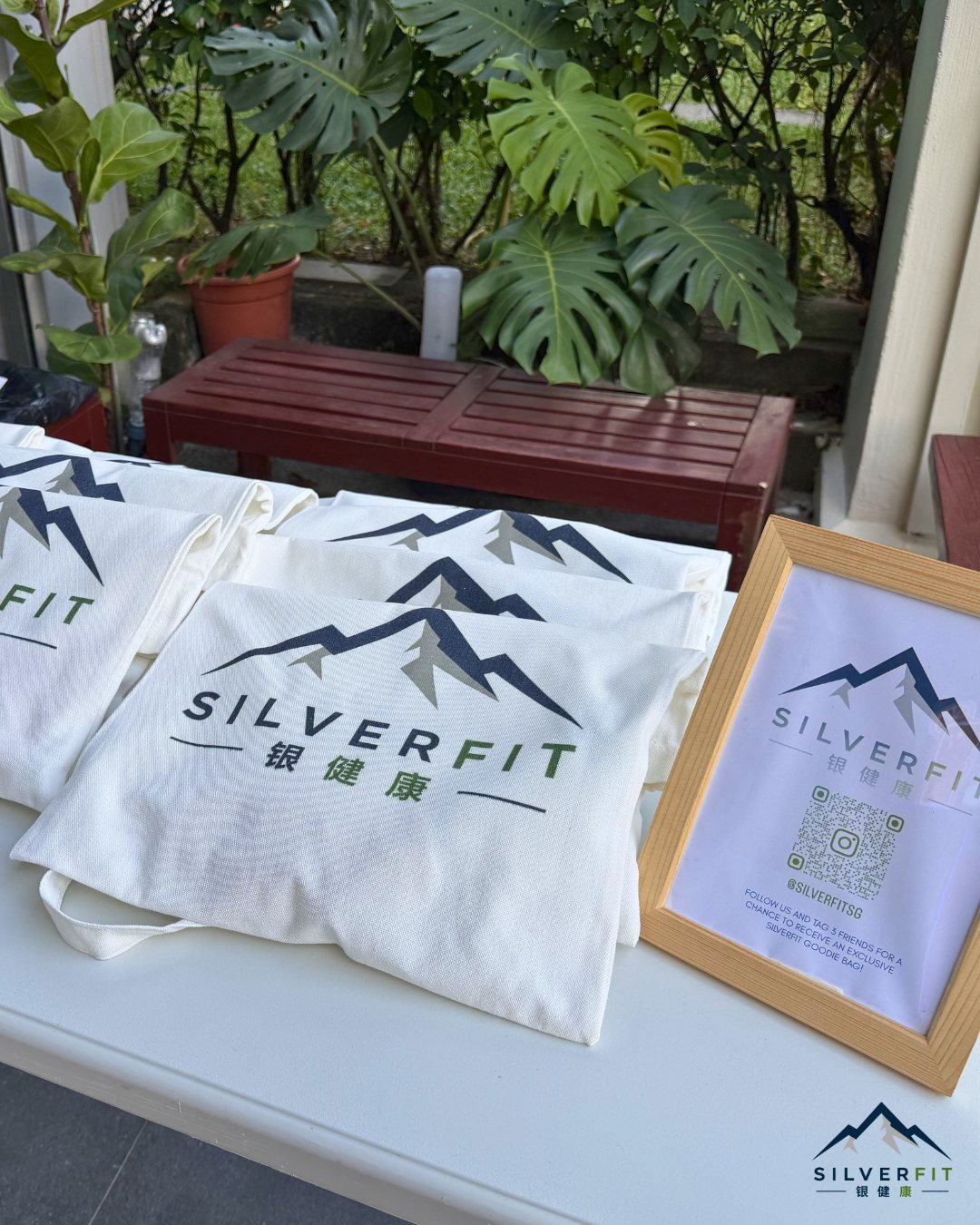 SilverFit branded tote bags and community welcome pack laid out at a session